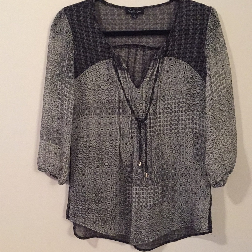 Women’s Shirt.  Size Small but fits more like Med.